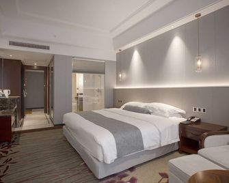 Ramada by Wyndham Suzhou Wujiang - Suzhou - Slaapkamer