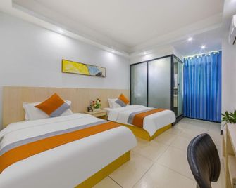 Bella Boutique Hostel - Haikou - Bedroom