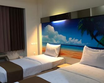 Image Hotel And Resto - Bandung - Bedroom