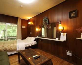 โรงแรมชิราฮามะ - นาโงะ - ห้องนอน