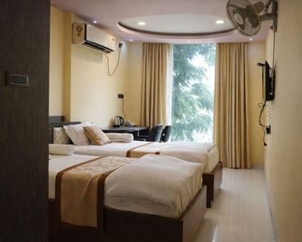 Hotel Mahal - A Unit of Ahiyan Restro - Durgapur - Bedroom