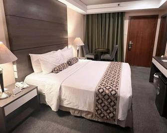 88 Courtyard Hotel - Manila - Bedroom