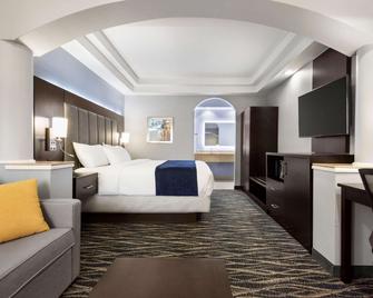 Days Inn & Suites by Wyndham Houston Hobby Airport - יוסטון - חדר שינה