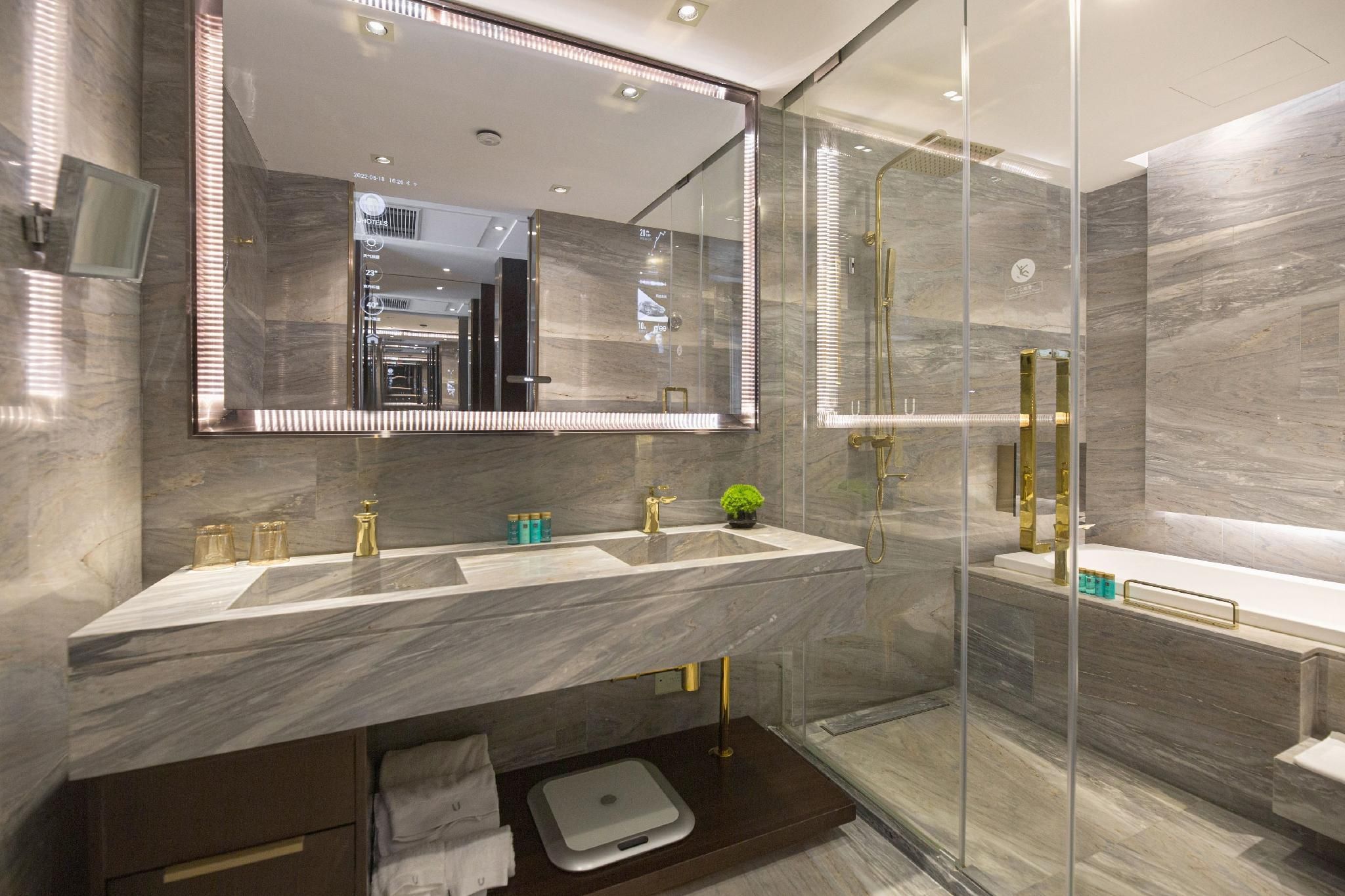 يو هوتلز - تشينغداو - غرفة نوم