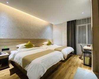 Vatica Fuzhou West Second Ring Road Xihu Park Hotel - Fuzhou - Habitación