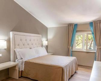 Hotel Villa Bolgheri - Marina di Castagneto - Slaapkamer