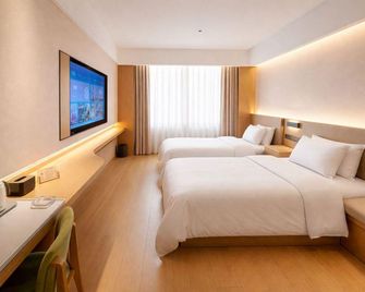 Nanjing Lukou Qiudu Hotel - Nankín - Habitación