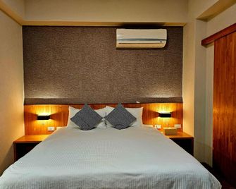 90 percent Bed and Breakfast - Hualien City - Ložnice