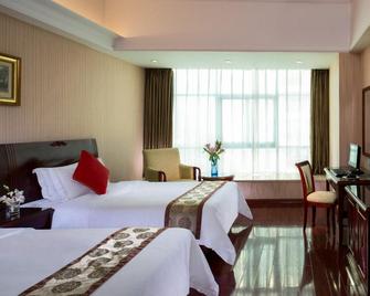 Vienna Hotel - Guangzhou South Railway Station Branch - Cantón - Habitación