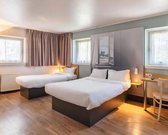 بد آند بريكفاست أوتل ليون سونتر مونبليزير - ليون - غرفة نوم