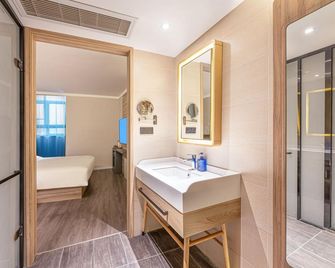 Hanting Hotel Changzhou Xuejia Aoyuan - تشانغتشو - غرفة نوم