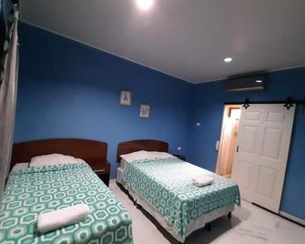 Cuartos Casa Blanca - León - Schlafzimmer