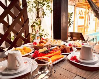 Aky Jeri - Pousada Vila De Jericoacoara - Jijoca de Jericoacoara - Food