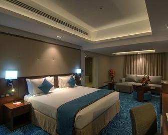 Ramee Dream Resort - Seeb - Phòng ngủ