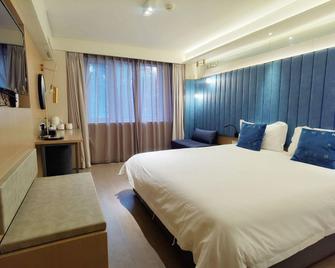 Piao Home Inn (Beijing West Railway Station) - Beijing - Bedroom