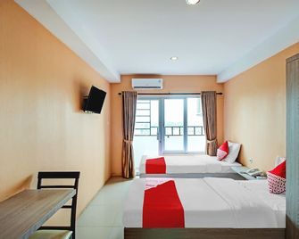 Hotel O Tridasa - Medan - Soveværelse