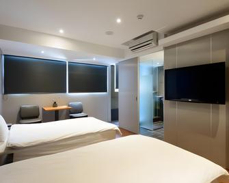 H106 Hao Zhu Inn - Taipei City - Bedroom