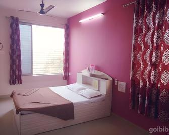 Relax inn - Matheran - Slaapkamer