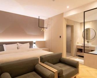 Goyang Yuji Hotel - Коян - Спальня