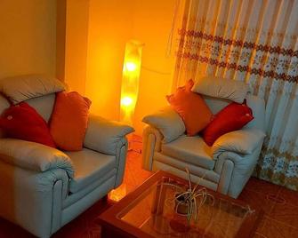 'Room 2 minutes from the center' (pets allowed) - Puno - Living room