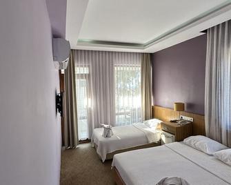 Lara Kapris Hotel - אנטליה - חדר שינה