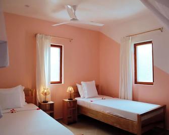 Kijani Beach Villas - Bwejuu - Schlafzimmer