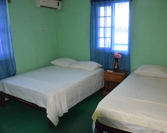 Hostal Green Coast - Hostel - Carenero - Bedroom