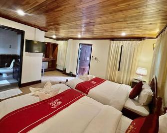 Villa Phathana Royal View Hotel - לואנג פראבאנג - חדר שינה