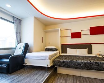 Yuan Chyau Motel - טאיצ'ונג - חדר שינה