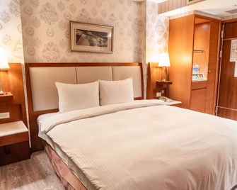 Elegance Hotel - Taipei City - Bedroom