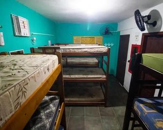 Farah Hostel Suítes Camping Smartcamp e Passeio de barco - Camburi - Bedroom