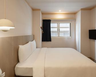 Kindness Hotel - Tainan Minsheng - Tainan City - Bedroom