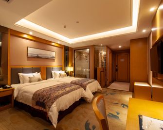 Devel International Hotel - Ji'an - Quarto