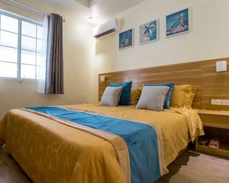 Residence Lodge - Garapan - Soverom
