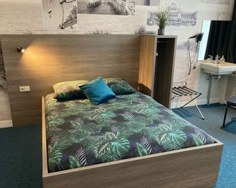 Hotel Poseidon Scheveningen - Den Haag - Schlafzimmer