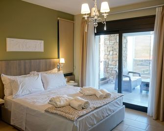 Agnes Deluxe Hotel - Pefkochori - Makuuhuone