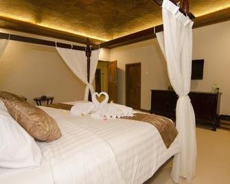 Syailendra Hotel Syariah - Джепара - Спальня