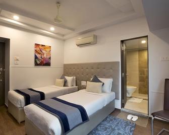 Planet Boutique Hotel - Mumbai - Quarto