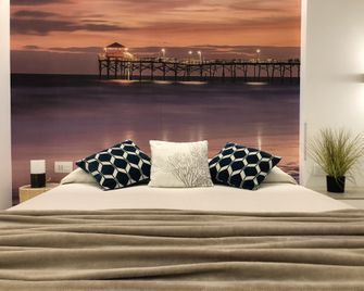 โรงแรมลิเบอร์ตี้บีช - ริคชิโอเน - ห้องนอน