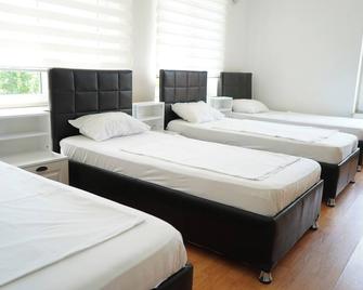 Hotel Aksu - Bucarest - Habitació