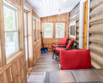 Two bedroom cabin with hot tub and fireplace. - Au Train - Living room