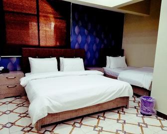 Diplomat Inn Hotel - Karachi - Bedroom