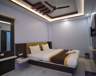 Hotel Asha Inn - Deoghar - Slaapkamer