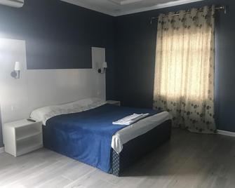 Incity Hotel - Bishkek - Bedroom