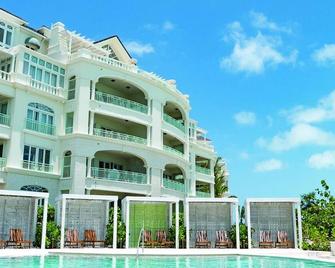 Junior Suite Haven with Pool View, Surrounded by Beauty, Snorkeling Access - Grace Bay - Building