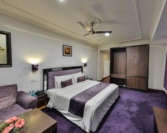 Batra Hotel And Residences - Srinagar - Slaapkamer