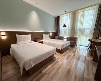 Starway Hotel Urumqi Railway Bureau Metro Station - Ürümqi - Habitación