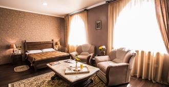 Shah Palace Hotel - Bishkek - Phòng ngủ