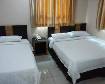 Hotel Traveller - Kota Kinabalu - Bedroom