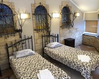Hotel Rodina- Hostel - Sergijew Possad - Schlafzimmer